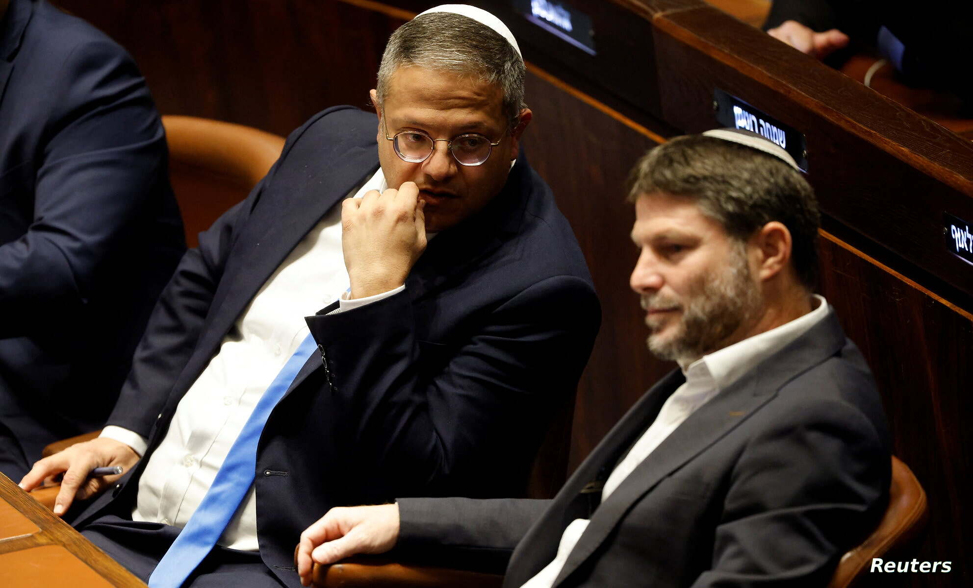 Right-wing Knesset members Itamar Ben-Gvir and Bezalel Smotrich attend a special session at the Knesset Israel’s parliament, to approve and swear in a new right-wing government, in Jerusalem