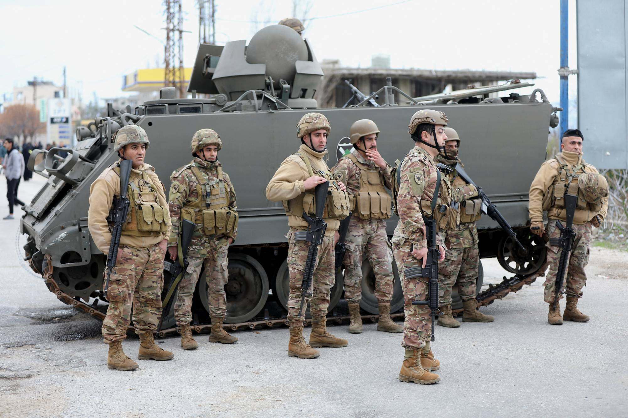 Members of the Lebanese army secure the area in Burj al-Muluk, near the southern Lebanese village of Kfar Kila